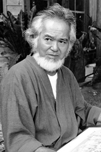 屋良朝春氏